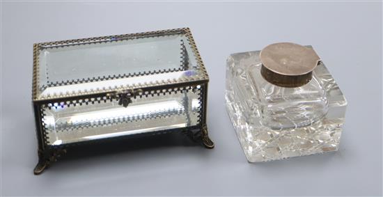 An early 20th century silver mounted glass inkwell and a glass casket.